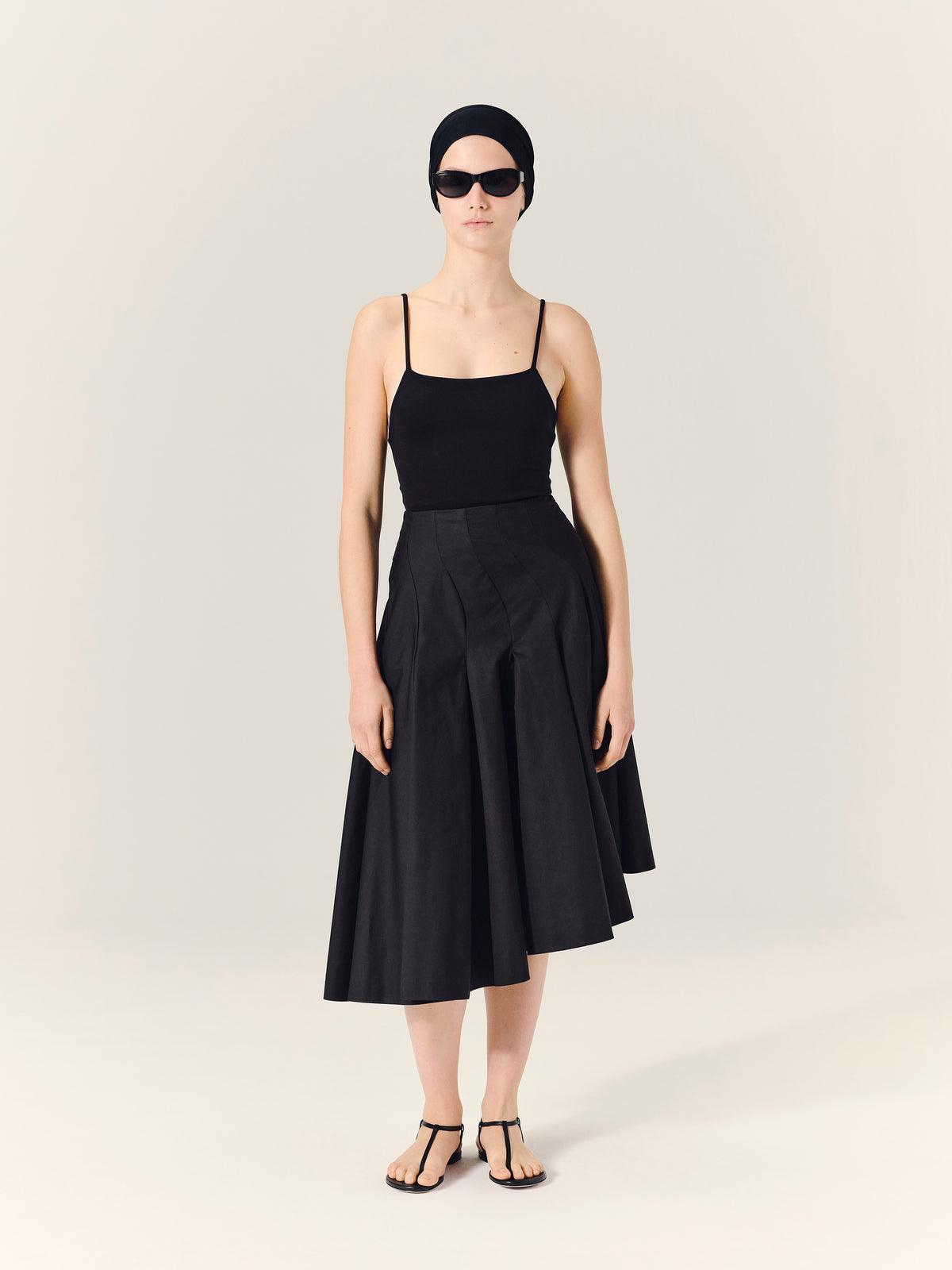 RIO Asymmetrical Pleated Midi Skirt in Black