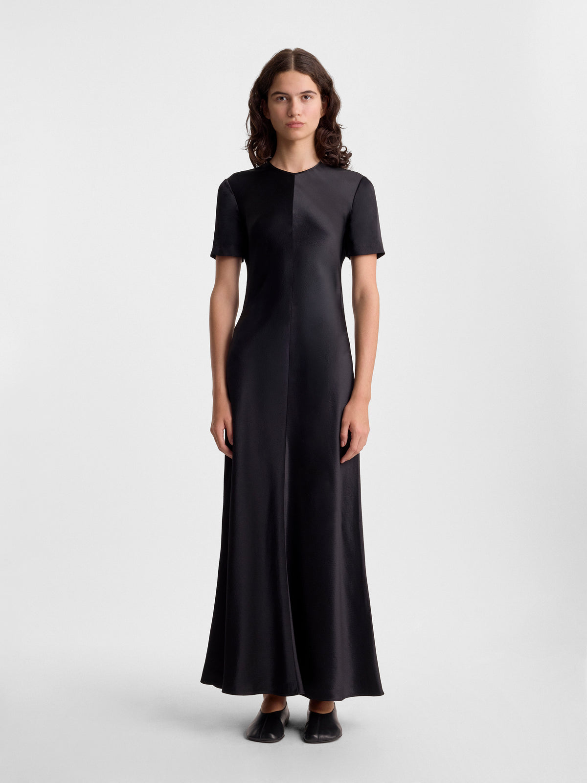 AKRITI.SHORT.SLEEVE.BIAS.CUT.DRESS_BLACK_FF00783-VI2514-001_FRONT