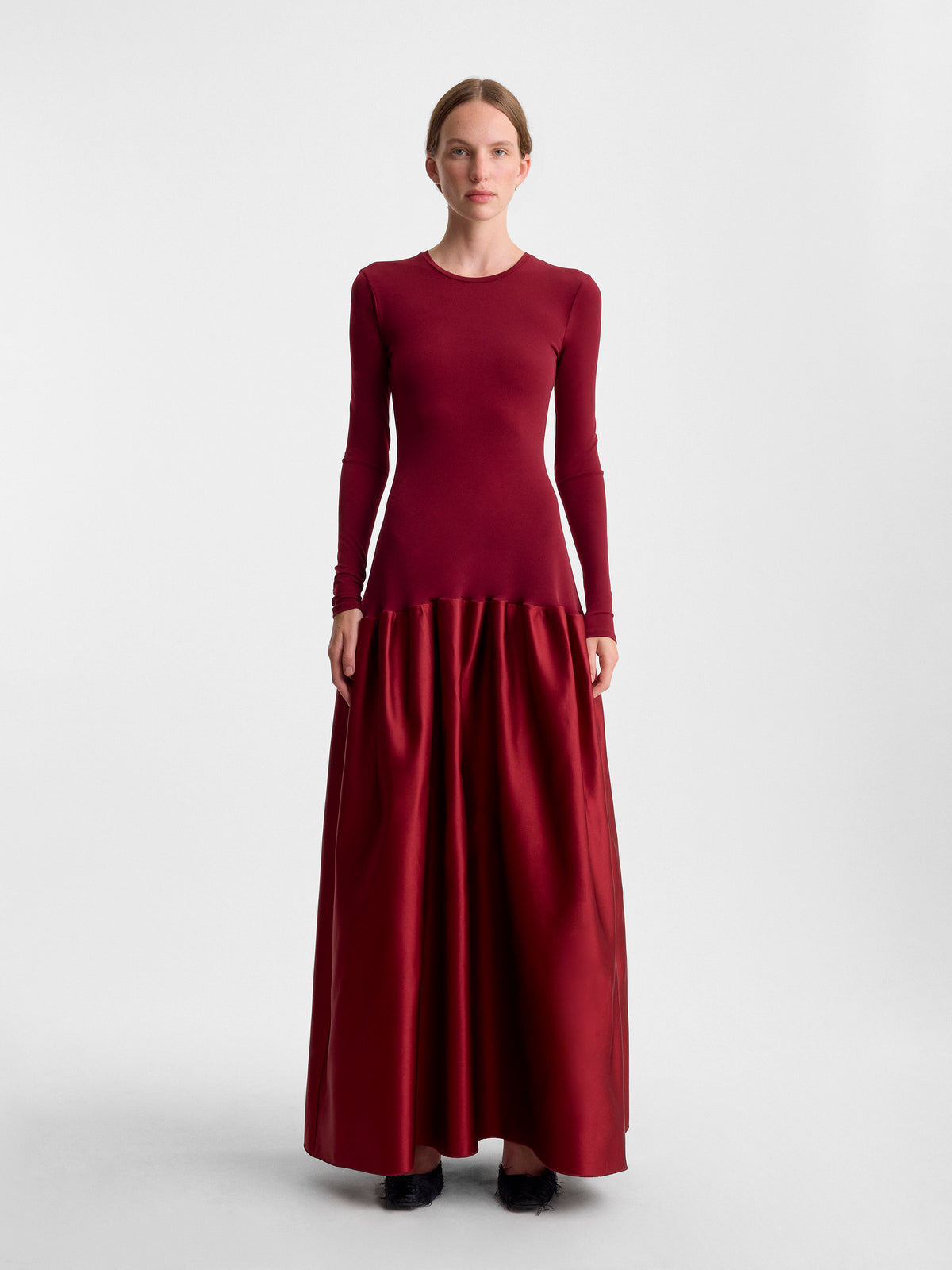 Fforme_FW26_CATRIN.BODYCON.JERSEY.WITH.DUCHESSE.FLARED.SKIRT_DARK.BORDEAUX_FF00615-PL2601-628_FRONT